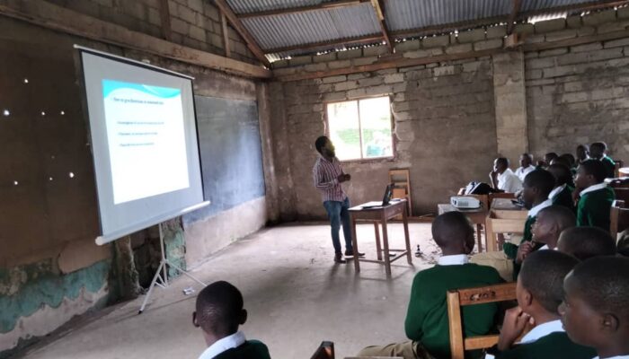 Isange Secondary - classroom with students using projector and screen